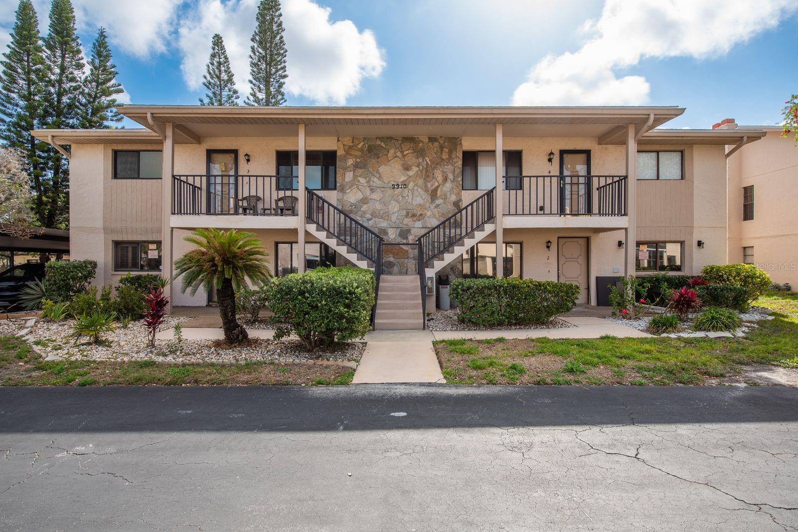 Great location! Come see this spacious and cozy Condo in the 55+ community of Eagles Point with Gulf Access. This two-bedroom, two-bathroom unit has an open floor plan and boasts a beautiful floor-to-ceiling stone, wood-burning fireplace in the living room. The kitchen offers generous counter space, has an abundance of cabinets, large closet pantry and breakfast bar/pass-through adjoining the dining room which makes serving a breeze and ensures you will never miss out on your favorite TV show or party conversations. Huge primary suite and guest bedroom, both large enough to accommodate a king-size bed and much more. Right off the living room you will enjoy the large, enclosed lanai all year round. The community includes a Heated swimming pool, clubhouse, billiards, private exercise room, boat dock, kayak storage, and more. Rent includes water, sewer, basic cable, and trash.