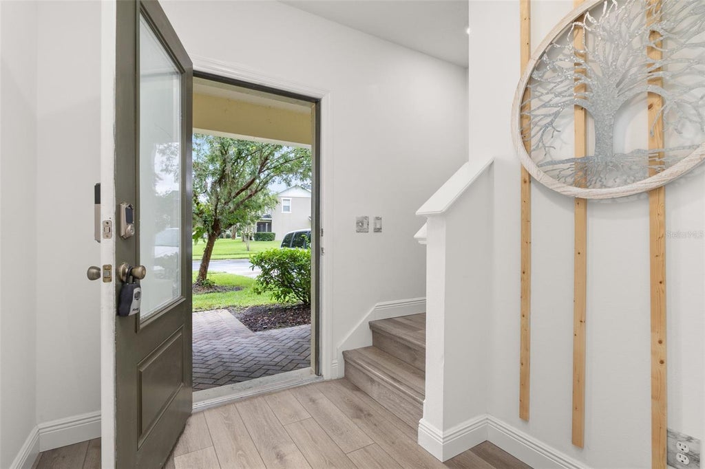 Photo of 9772 Tivoli Villa Drive, Orlando, FL 32829 (MLS # S5159173)