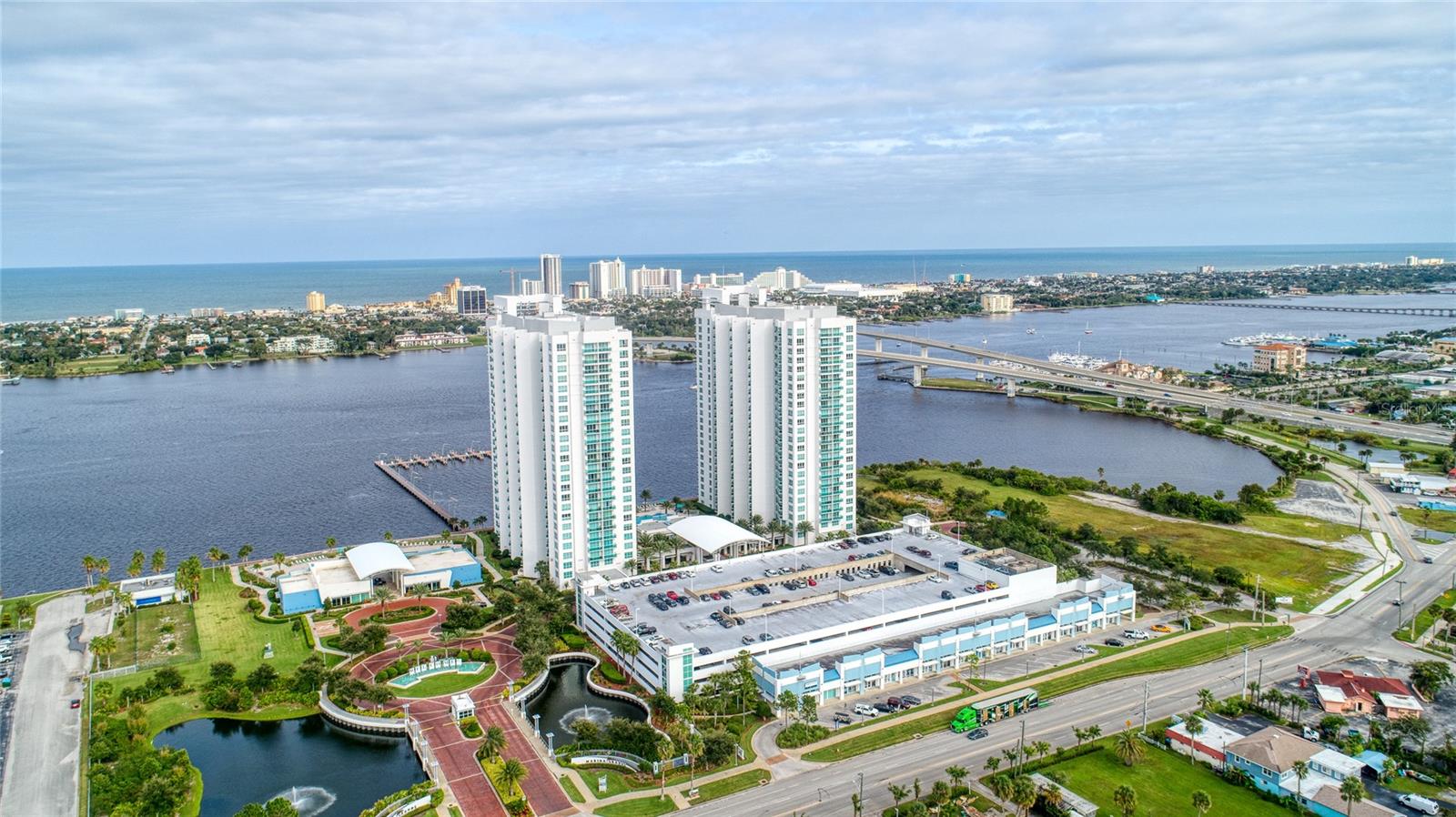 Opportunity knocks! Attractive Owner financing is offered for this wonderful condo (details upon request). Enjoy the river views & beautiful breezes from the balcony of this well maintained home. Appliances in tip-top shape new in 2024. Recently painted & new high grade carpet. Large Primary Suite has walk in closet & bathroom features double sinks, walk in shower & Jacuzzi tub. Large secondary bedroom also has its own bathroom with glass enclosed shower. . Maintenance Fee includes: Spectrum TV, Internet, Hot Water, Air conditioning, Theater, Billiard Room, Gym, Sauna, Card Room, Ballroom, 2 Pools, hot tub. Concierge on duty each day & 24 hour security. All furniture is available.