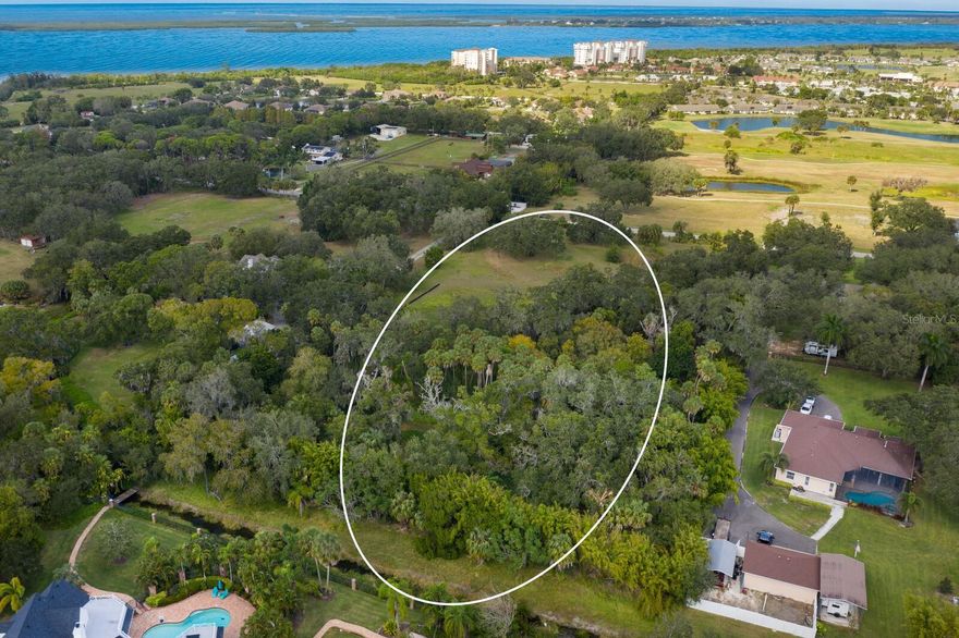 Gorgeous 5 Acre Estate Lot in West Palmetto!!! This is your opportunity to craft the home of your dreams on a pristine sprawling lot, or explore the potential to subdivide into smaller lots. Situated in a truly breathtaking location, this property borders the picturesque Terra Ceia Bay, offering a unique blend of country living with all the conveniences of city life. Location is key, and this estate lot provides the best of both worlds. With close proximity to I-275, your daily commute to St. Petersburg and Tampa is effortless, allowing you to enjoy the tranquility of your country retreat while staying well-connected to urban amenities. For water enthusiasts, the easy access to Terra Ceia Bay and the Manatee River will delight boaters and water lovers. Golf aficionados will relish the proximity to the Terra Ceia Bay Country Club, which is just a short 3-iron away. What sets this property apart is the absence of HOA and CDD restrictions, giving you the freedom to bring your boat, RV, and all your other toys. If you have horses, that's not a problem either, as this property is zoned to accommodate your equestrian companions. Recent annexation into the city ensures that city sewer and water services are readily available on the street, simplifying the building process and adding value to this extraordinary estate lot. Don't miss out on this incredible opportunity to turn your dream into reality. Schedule a showing today, and start building the home you've always envisioned. Your future begins here!