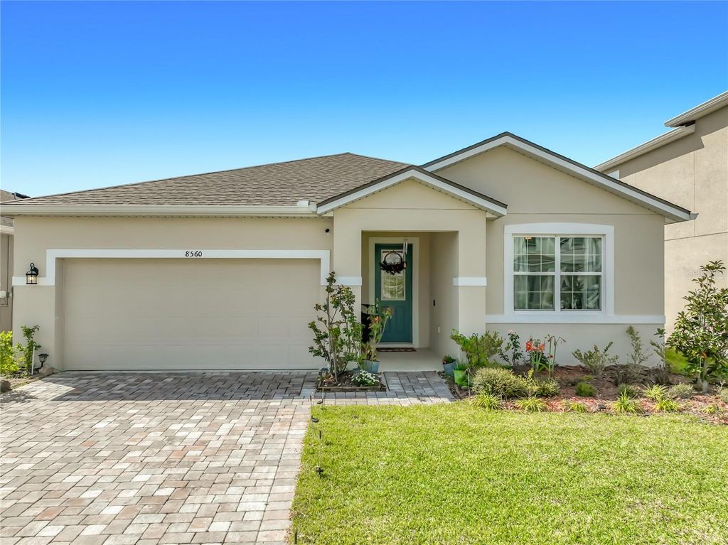 Photo of 8560 Compass Point Avenue, Orlando, FL 32832 (MLS # O6397604)