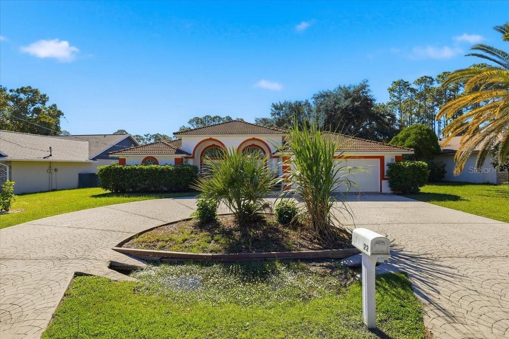 Photo of 22 Bassett Lane, Palm Coast, FL 32137 (MLS # FC322090)