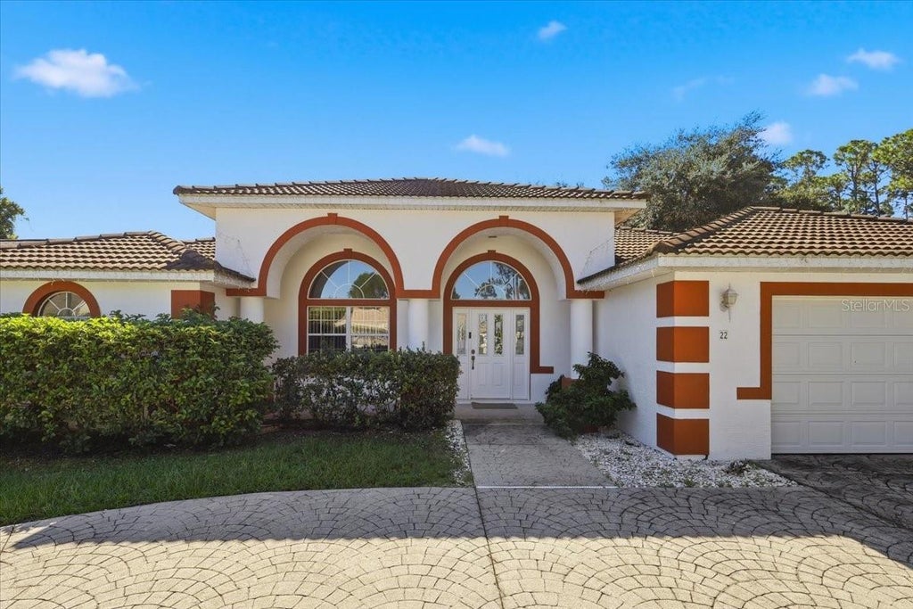 Photo of 22 Bassett Lane, Palm Coast, FL 32137 (MLS # FC322090)