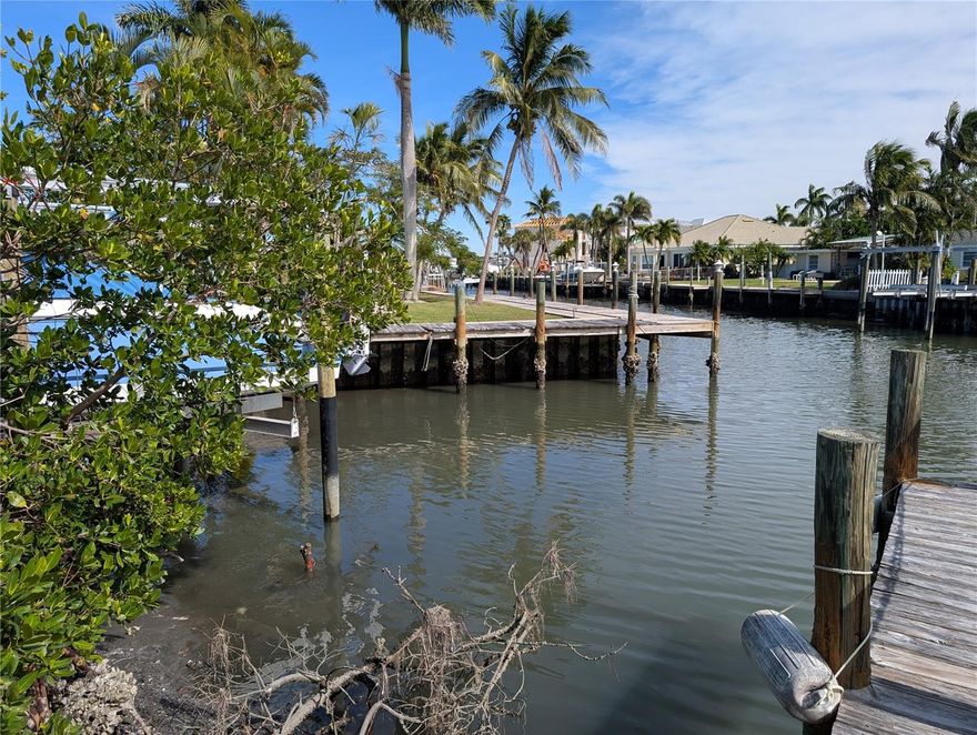 Don’t miss this extremely rare opportunity to own a privately deeded boat slip in the heart of Holmes Beach on Anna Maria Island. Located at 8303 Marina Dr – Slip 13, this slip offers direct saltwater canal access leading straight into the Intracoastal Waterway, with just minutes from the dock to open Tampa Bay. From there, enjoy effortless access to the Gulf of Mexico, Egmont Key, Longboat Pass, and some of the best boating waters on Florida’s west coast. This slip measures 10’x30’ and is ideal for center consoles, bay boats, flats boats, and similar vessels up to 24' in length. Whether you’re heading out for a day of fishing, cruising the ICW, or exploring local islands, this location lets you get on the water quickly and without hassle. Privately owned slips like this are almost never available in this area. Unlike marinas or associations with waiting lists and monthly fees , this slip offers true ownership with no recurring charges and no reliance on third-party availability. It’s a perfect setup for island residents, part-time boaters, anglers, or anyone wanting reliable water access near home. Buyer is responsible for all due diligence, including but not limited to vessel size, improvements, water depth, zoning, permitting, and intended use. A seldom-offered chance to claim a piece of island waterfront lifestyle with exceptional access, prime location, and lasting value. Opportunities like this do not come up often on Anna Maria Island.