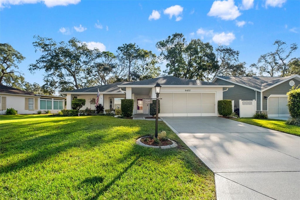Photo of 6432 Pine Meadows Drive, Spring Hill, FL 34606 (MLS # W7890456)