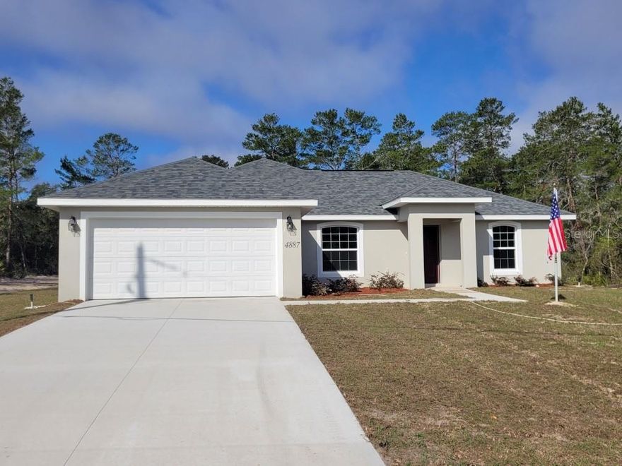 Stop Renting & Secure Up to $100,000 with the down payment assistance program.. available now! Experience modern living in this 2,187 sq. ft. haven situated on a massive 15,000+ sq. ft. lot. Designed with an open split-floor plan and soaring cathedral ceilings, this home blends style with massive value. *** Chef’s Kitchen: Granite countertops, premium stainless appliances, wood soft-close cabinetry, and an 8-ft serving bar. *** Master Retreat: An exceptionally large suite featuring a massive walk-in closet and a spa-like bath with custom tile work. *** Living & Entertaining: Spacious living area leading to a huge enclosed lanai—perfect for year-round relaxation. *** Quality Finishes: block construction, epoxy garage floors, upgraded fixtures, and tile in all wet areas.  Disclaimer: $100K assistance program is subject to buyer qualification, lender approval, and fund availability. Buyer must verify all program details with an approved lender. Equal Housing Opportunity.