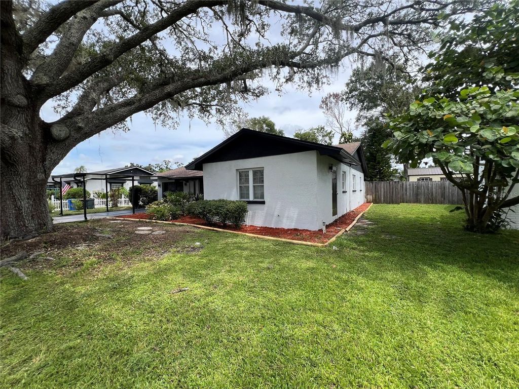 Photo of 7703 W Hiawatha Street, Tampa, FL 33615 (MLS # TB8414154)