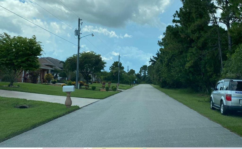 Photo of 15621 Alsask Circle, Port Charlotte, FL 33981 (MLS # A4654161)