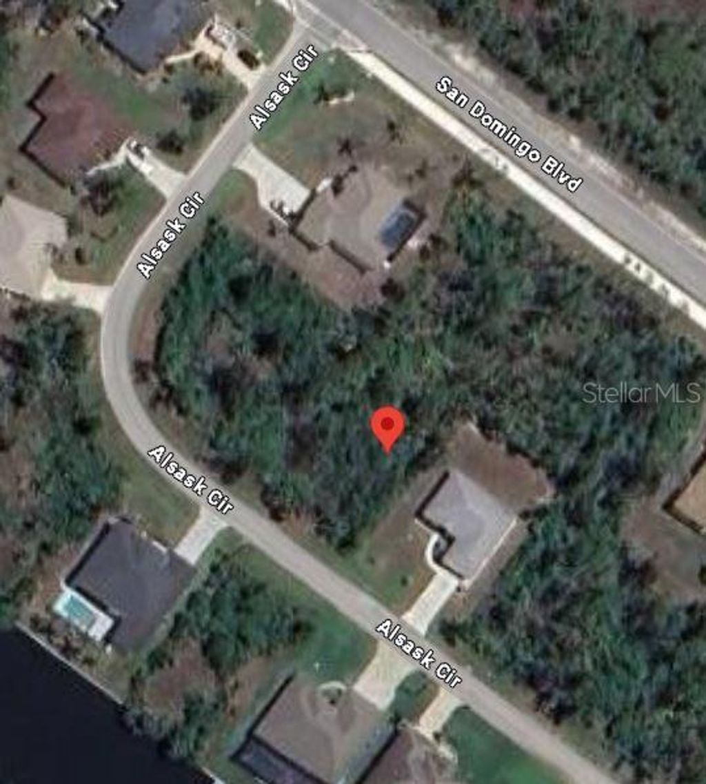 Photo of 15621 Alsask Circle, Port Charlotte, FL 33981 (MLS # A4654161)