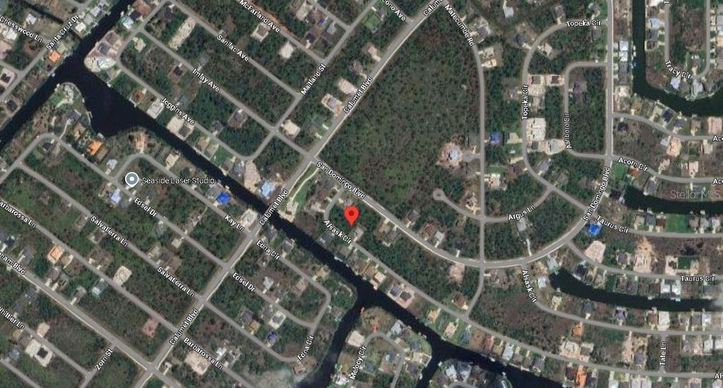 Photo of 15621 Alsask Circle, Port Charlotte, FL 33981 (MLS # A4654161)