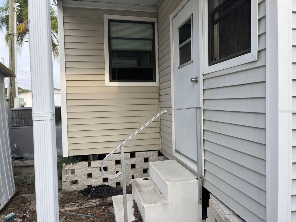 Photo of 667 Yawl Lane, Palm Harbor, FL 34683 (MLS # TB8454258)