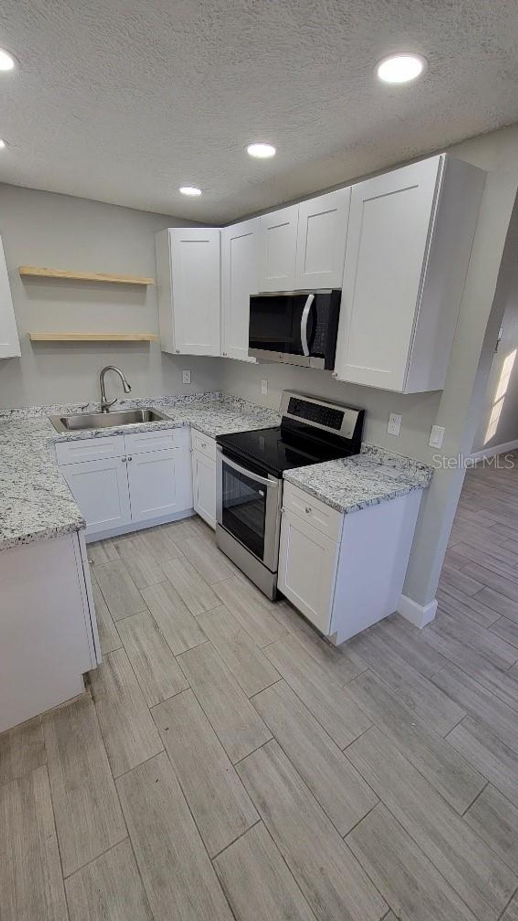 Photo of 4715 W Wallcraft Avenue, Tampa, FL 33611 (MLS # TB8441217)