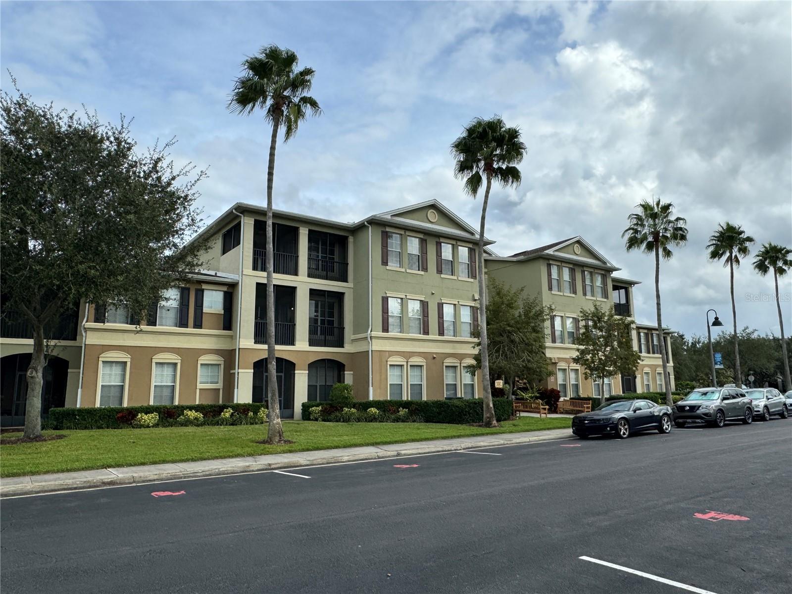 Great location in Windermere walking distance to restaurants and shopping. Great community with pool and fitness center. Second floor but elevator available. Split bedrooms. Washer/drier included. Wood floors in main living area. Upgraded kitchen