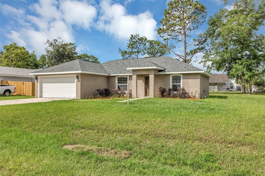 Welcome to this beautiful, 2022-built home featuring a spacious split-bedroom floor plan and soaring cathedral ceilings in the living room and kitchen. The entire interior boasts fresh paint and brand-new Luxury Vinyl Plank flooring in the main areas and bedrooms, with durable tile in the wet areas.

The kitchen features stainless steel appliances, stunning granite countertops, and upgraded wood cabinetry with self-closing drawers and doors. Entertaining is effortless with an eight-foot serving counter and sliding doors that open to a spacious, attached enclosed lanai.

The private master suite offers a walk-in closet and a luxurious bath complete with custom tile work, granite counters, and matching wood cabinetry. This move-in-ready gem offers all the perks of a new build with beautiful, modern updates.  Call today and schedule a tour!