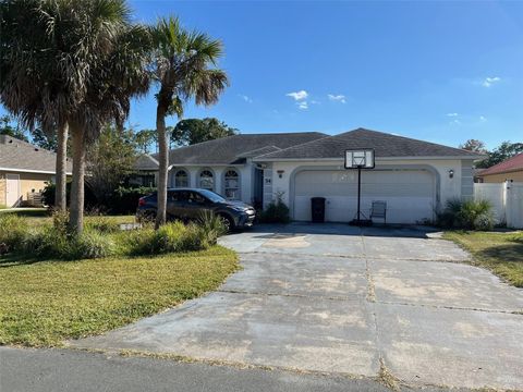 Photo of 34 Woodhollow Lane, Palm Coast, FL 32164 (MLS # FC314124)