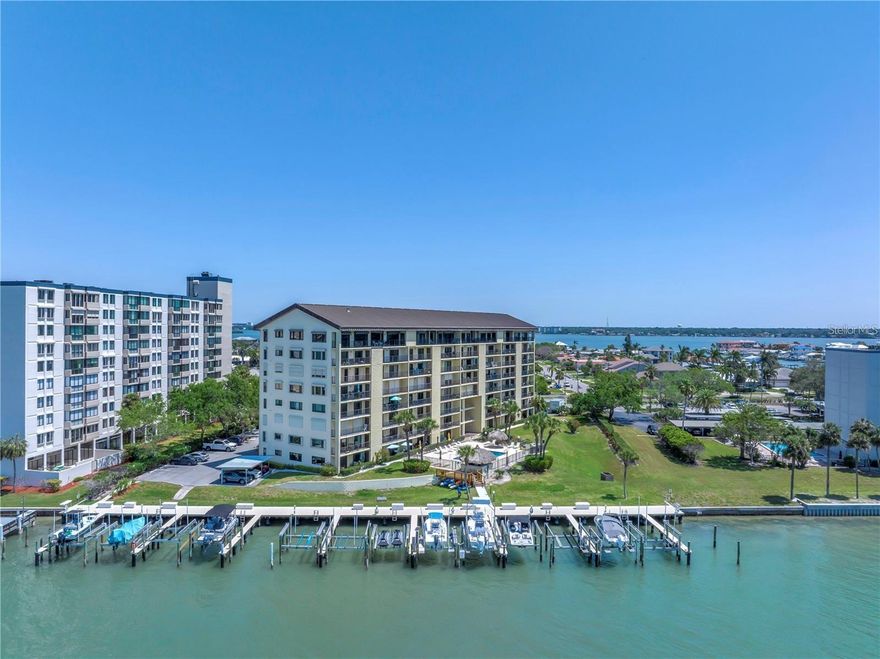Welcome home to this beautiful, updated, waterfront, second floor condo that sits on one of the highest elevation points in Island Estates and is situated on the beautiful Clearwater intercoastal waters. Sit and relax on your private balcony and enjoy the beautiful sunsets while enjoying a glass of wine or your favorite beverage. Enjoy watching boats and sea life as they make their way by the relaxing community pool and tiki bar on the intercoastal waterway. Enjoy turnkey living with this completely furnished unit with updated hurricane rated sliding doors installed in 2024. Access is off both the primary bedroom and living room. Newer AC replaced in 2022. This unit was not impacted by any of the recent storms that came through the area. Have peace of mind knowing that this building has passed the recent Milestone inspection. Enjoy the many amenities of living in Island Estates including the Clearwater Marine Aquarium, Publix, several restaurants, park/playground, plus much more. Clearwater Beach is only a short drive/walk away, which was ranked one of the best Florida beaches, and has many nice restaurants and activities for your convenience. Schedule a showing today and own your own slice of paradise.great investment potential.No minimum years of ownership required to rent your unit. Some units rent for $2500-$3000 a month. Brand new hurricane impact windows installed August 2025