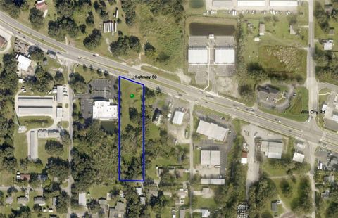 Photo of 1244 W Broad Street, Groveland, FL 34736 (MLS # TB8365113)