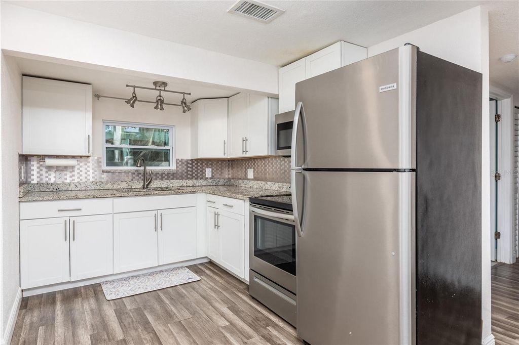 Photo of 4978 71st Street N, St Petersburg, FL 33709 (MLS # TB8512419)