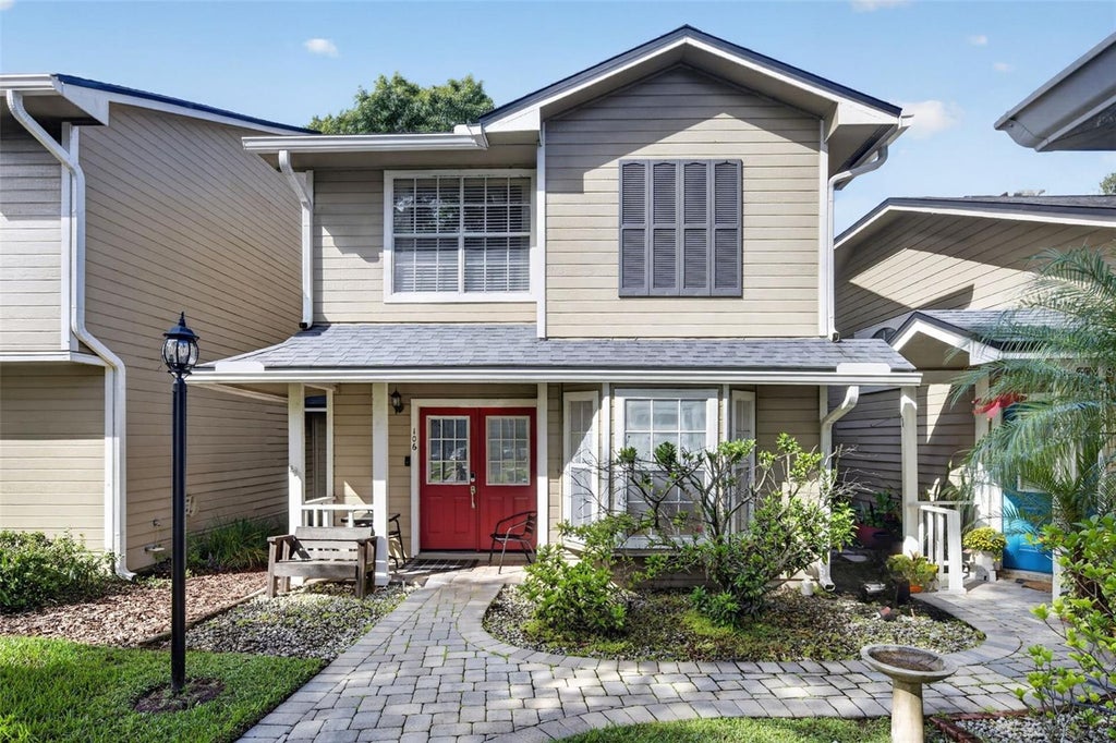 Photo of 6020 Scotchwood Glen #106, Orlando, FL 32822 (MLS # O6452757)