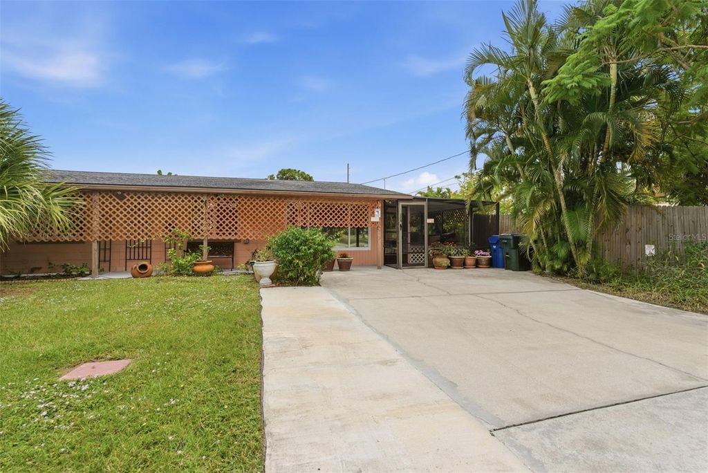 Photo of 857 Palmetto Street, Englewood, FL 34223 (MLS # A4670750)