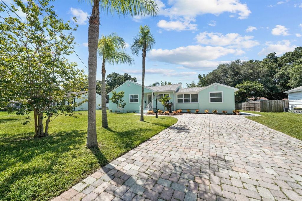 Photo of 814 W Indiana Avenue, Tampa, FL 33603 (MLS # TB8479037)