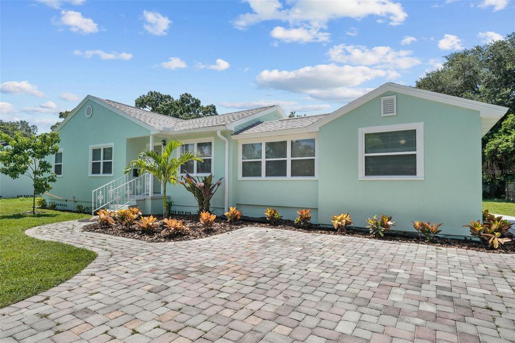 Photo of 814 W Indiana Avenue, Tampa, FL 33603 (MLS # TB8479037)