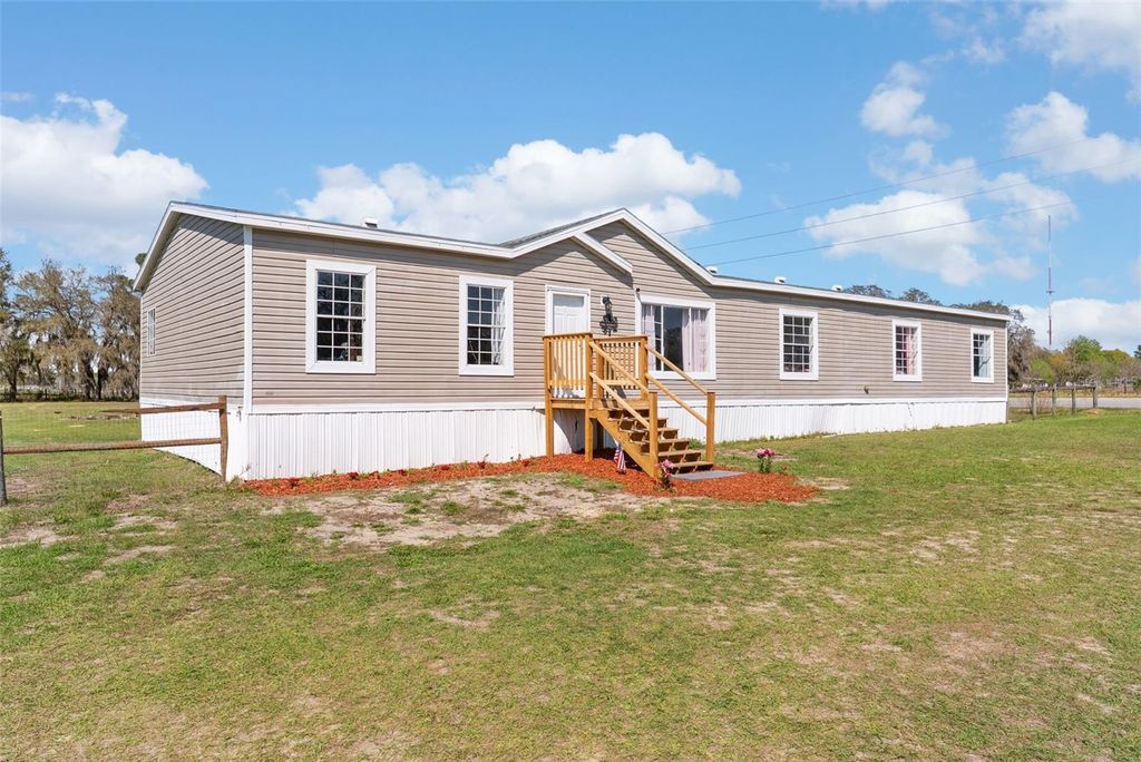 Photo of 8155 SE 121st Place, Belleview, FL 34420 (MLS # O6393062)