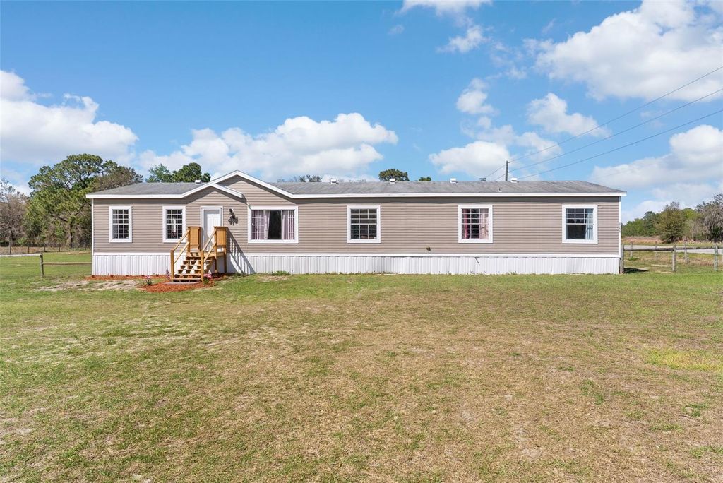 Photo of 8155 SE 121st Place, Belleview, FL 34420 (MLS # O6393062)