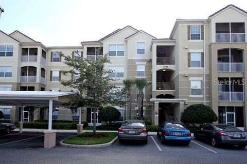 Photo of 3344 Robert Trend Jones Drive, Orlando, FL 32835 (MLS # O6401593)
