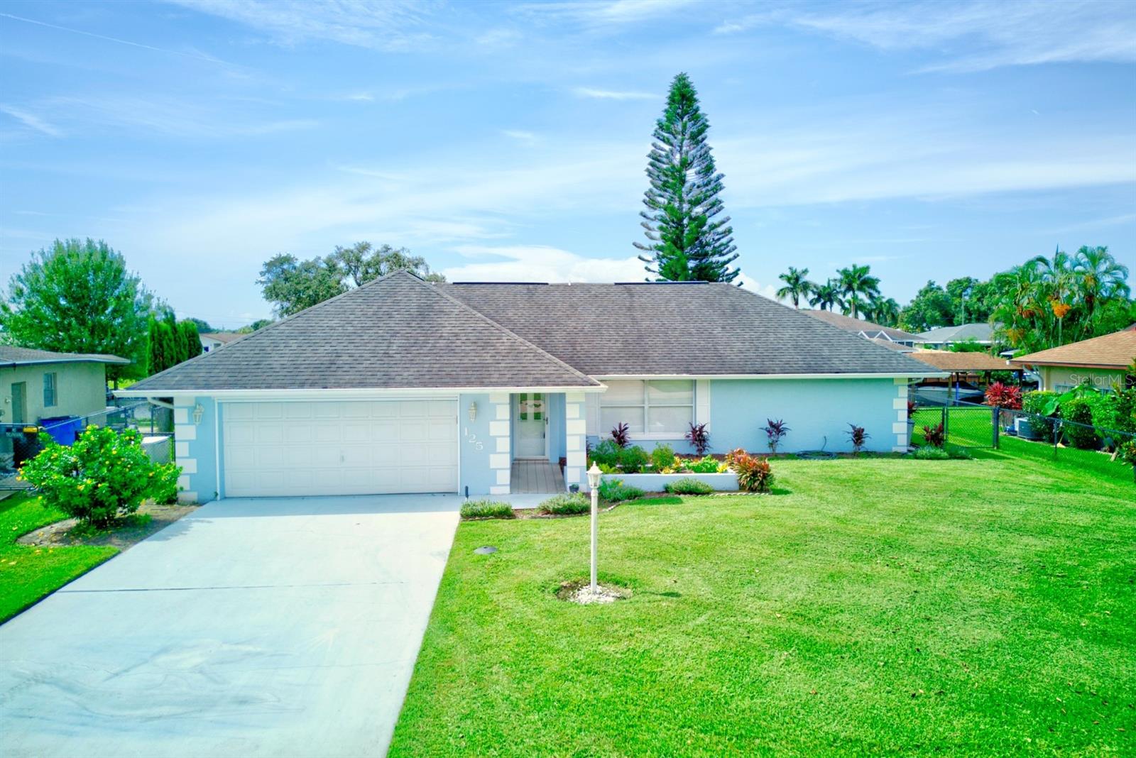 Welcome to your perfect getaway in beautiful Lake Placid, Florida! This 2-bedroom, 2-bathroom canal-front which is the second canal from being on the lake offers direct access to the highly sought-after Lake June, making it ideal for boating, fishing, or simply enjoying life on the water. Step inside to find a warm and inviting home that comes fully furnished, ready for you to move right in and a spacious dock with plenty of room to relax, entertain, and store your boat. The property shines with fantastic curb appeal, lush landscaping, and a whole-home generator for added peace of mind. Enjoy relaxing mornings by the water, evenings entertaining friends, or quick outings to the lake just moments from your backyard. With its prime location, thoughtful features, and turn-key setup, this home is perfect as a full-time residence, vacation retreat, or investment opportunity.