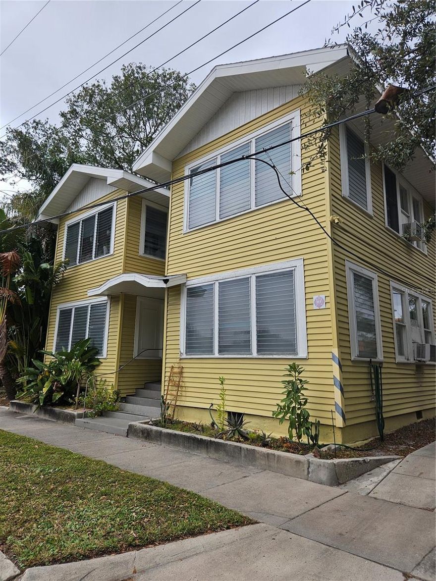 Introducing in the Heart of Hyde Park: a charming, New Orleans-style eight-unit apartment building. This property consists of two quadplexes connected by an exterior open hallway. Each unit is a spacious one-bedroom, one-bath featuring a large kitchen and dining area, as well as a sunporch. The units boast beautiful hardwood floors, high ceilings, and generous closet space.  Each apartment offering approximately 840 square feet of living space.  Roof replaced 2021.   Exterior painted 2021.  Upgraded electric amperage 2017.  Additional amenities include front and back doors to each unit, an on-site laundry facility, and window air conditioning units. The building is 100% leased.  There are eight on-site parking spaces and ample street parking available. Located in a non-flood zone.   Zoned RM-24.  Value added with below market rents (ACTUAL current rents for all 8 apartments average $1,490/mo).