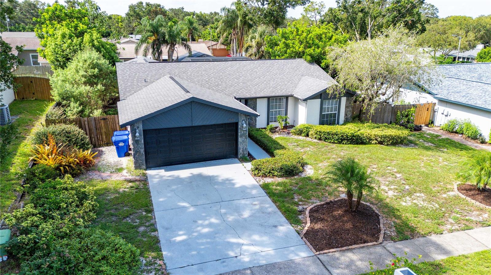 Experience the quintessential Florida lifestyle in this beautifully appointed 4-bedroom, 3-bathroom pool home, perfectly situated in the neighborhood community of the Hammocks of Palm Harbor—just minutes from the sparkling Gulf and some of Florida’s most pristine beaches. Whether you envision mornings walking along the shoreline, afternoons exploring vibrant coastal towns, or evenings by the pool under a painted sunset sky, this home offers the ideal setting for it all.
From the moment you enter, you’ll be welcomed by an airy, open floor plan bathed in natural light, designed for effortless indoor-outdoor living. At the heart of the home, a 360-square-foot climate-controlled sunroom—separate from the listed heated square footage—provides a versatile retreat for year-round enjoyment. This inviting space connects seamlessly to the main living areas and overlooks your private screened lanai and sparkling saltwater pool.
The private primary suite features dual walk-in closets and french doors that open to the sunroom and en-suite bathroom with dual sinks and a door from the bathroom to the pool area creating a peaceful transition between spaces and convenient pool bath. The second bedroom offers remarkable flexibility as a junior suite, complete with its own ensuite bath, walk-in closet, and matching French doors to the sunroom, making it perfect for multi-generational living or hosting guests in style.
The 3 bedroom offers ample space and a walk in closet with an additional 4th bedroom across from the 3rd full bath. Every detail of this home has been thoughtfully updated for comfort and peace of mind. MAJOR IMPROVEMENTS in 2021 include a new roof, main house A/C, new hot water heater and luxury vinyl plank flooring, and a new salt water pool system, Fully remodeled bathrooms were completed in 2021 or later. Fresh exterior paint in 2025 enhances curb appeal, while the pool—resurfaced in 2015 with a durable Gulfstream finish and paired with a 2020 pool pump—shines as the centerpiece of your private backyard oasis. The FULLY FENCED yard also features a storage shed, and an exterior deck offering both functionality and privacy.
Situated less than two miles from the charm and energy of downtown Palm Harbor, you’ll have quick access to locally loved restaurants, boutique shopping, marinas, and community events. Just a short drive away are Crystal Beach Pier, Honeymoon Island State Park, and the sandy stretches of North Beach, while top attractions like Clearwater Marine Aquarium, Busch Gardens, and The Dali Museum are all within easy reach. Two international airports—St. Pete–Clearwater and Tampa—offer convenient travel options.
Whether you’re seeking a primary residence, seasonal escape, investment or high-demand short-term rental, this fully furnished home delivers exceptional flexibility. With an optional HOA, a location safely outside the flood zone, and a track record of staying dry even through the last hurricane season, it’s more than a home—it’s a worry-free slice of Gulf Coast paradise ready to be enjoyed from day one.