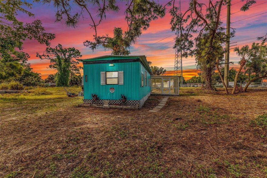 Welcome to 8319 Roosevelt in the sought-after Charlotte County side of Englewood—a rare opportunity to own your land with NO HOA and no rental restrictions, making this a perfect investment property, long-term rental, or Airbnb opportunity.

This 2-bedroom, 1-bathroom singlewide sits on an oversized 0.31-acre lot, offering space, privacy, and flexibility that’s hard to find at this price point. Inside, you’ll find updated flooring throughout and a bright, open layout where the living room flows seamlessly into the kitchen—perfect for everyday living or hosting guests. The refrigerator is brand new and has a warranty with it.  The bathroom features a walk-in shower for convenience and accessibility.

Step outside to the screened-in lanai, an ideal spot to unwind and take in those beautiful Florida sunsets—an attractive feature for both homeowners and vacation renters. The land has been recently cleared, giving you a clean, open outdoor space with room for expansion, parking, or recreation.

Recent updates add peace of mind, including a brand-new wall A/C unit with warranty that also has heat to it and a 40-gallon water heater installed in 2019 (warranty valid through this year). Electrical service was updated in 2026 and has a new electrical pole.  Located in an X flood zone, this property typically does not require lender-mandated flood insurance.

You’ll love the location on the Charlotte County side of Englewood—known for its relaxed coastal lifestyle with convenient access to everything you need. Nearby schools include Vineland Elementary School, L.A. Ainger Middle School, and Lemon Bay High School.

For beach lovers and vacation guests alike, you’re just minutes from Englewood Beach and Stump Pass Beach State Park, offering pristine Gulf waters, boating, fishing, and world-class sunsets. Everyday conveniences are close by, including Publix Super Market and Walmart Supercenter, with medical care available at HCA Florida Englewood Hospital.

Commuting is easy with access to State Road 776 (S McCall Rd), connecting you to nearby cities like Port Charlotte, North Port, and Venice.

Whether you’re searching for a seasonal retreat, full-time residence, first-time home, or an income-producing property, this one checks all the boxes—owned land, no HOA, no rental restrictions, and a prime location near the coast.
