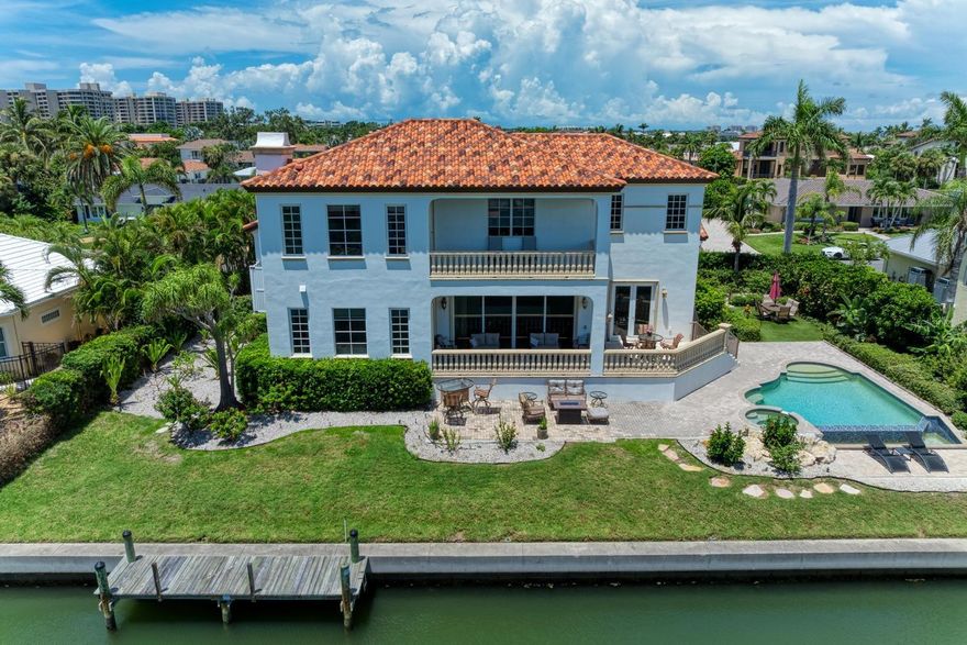 Price improvement ….ELEVATED Waterfront Luxury on Longboat Key! Welcome to 550 Yardarm Lane, where the elegance of Longboat Key meets the ease of Florida’s coastal lifestyle in the coveted Country Club Shores. This waterfront masterpiece isn’t just a home, it’s your front-row seat to paradise, where boating, beach walks, and year-round sunshine are part of everyday life. Step inside and be instantly captivated by sparkling water views, soaring spaces, and the perfect blend of casual comfort and refined luxury. Designed for both relaxation and unforgettable entertaining, this 5-bedroom, 5.5-bath retreat is tailor-made for hosting family and friends in style. PRIME WATERFRONT LIVING - Private dock on a deep-water canal with no-bridge access to the bay, perfect for your weekend cruiser. LIGHT & BRIGHT OPEN LAYOUT - Walls of glass bring the outdoors in, filling the home with sunshine and stunning water views. ELEVATOR - Effortless access to main living levels from the three car garage. CHEF’S DREAM KITCHEN - High-end appliances, custom cabinetry, and an oversized island ready for gourmet meals and lively gatherings. LUXURIOUS SUITES - Owner’s retreat with a private balcony, spa-inspired bath, and dual walk-in closets. MOVIE ROOM - Your own private theater for cozy nights in. OUTDOOR OASIS - infinity pool, spacious patio, and lush landscaping for poolside lounging or sunset soirees. All this just steps to your DEEDED BEACH ACCESS and minutes from the world-class dining, shopping, and cultural treasures of St. Armands Circle and Downtown Sarasota. Whether you’re dreaming of a full-time Florida home or a seasonal escape, 550 Yardarm Lane delivers the ultimate Longboat Key lifestyle.