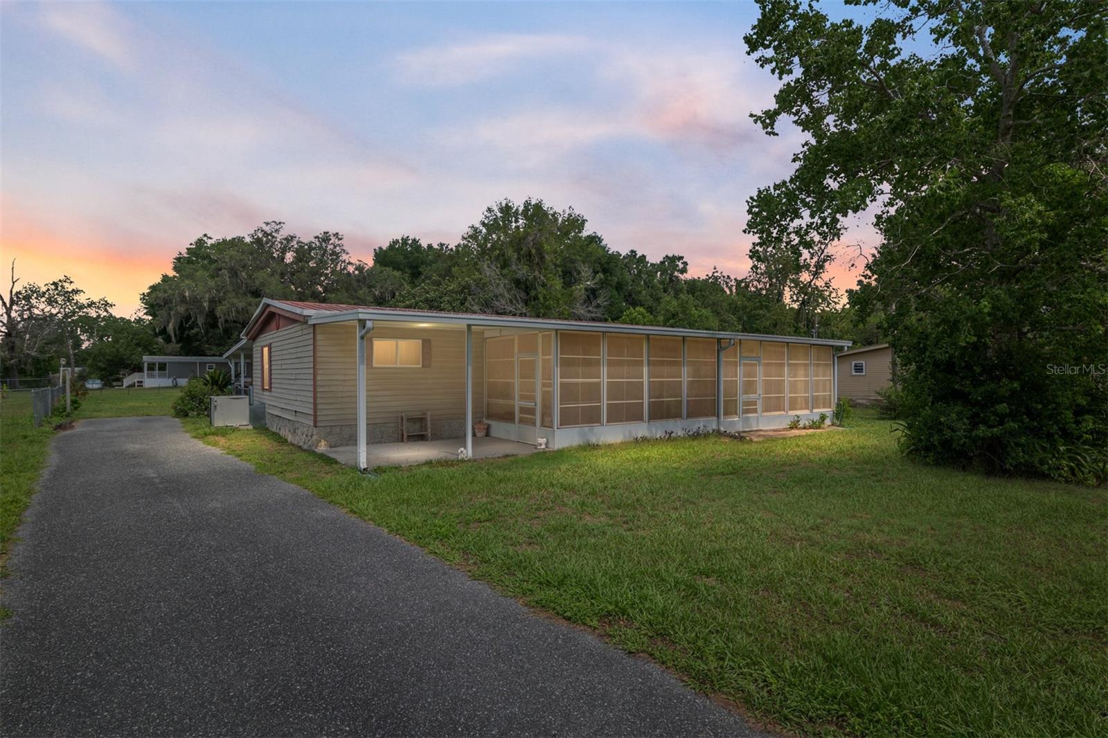 Charming & Well-Cared-For Double Wide Home in Belleview.
Welcome to this beautifully maintained double wide that has been lovingly cared for over the years. This inviting home offers a perfect blend of comfort, space, and charm, making it ideal for anyone seeking relaxed living.
Featuring a bright, open floor plan with generous living and dining areas, a spacious kitchen with ample cabinetry, and cozy bedrooms. Enjoy morning coffee on the covered porch or entertain guests in the private yard — a perfect spot for gatherings or quiet moments.
Conveniently located near local amenities, parks, and shops, this property is move-in ready and waiting for its next owner to love it just as much.
Don’t miss this opportunity — schedule your showing today!