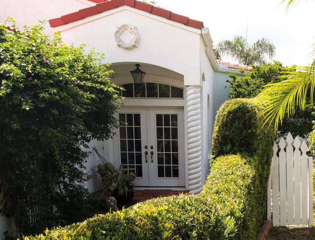 This home is located in one of the best locations in Northwest Bradenton. Minutes to the sugar sand beaches of the Gulf of Mexico, Robinson Preserve with hiking and kayak water trails, and the DeSoto National Park on the banks of the Manatee River. The community common area features 450 feet of trec boat dock, clubhouse, pool, spa, with tennis and pickle ball courts. Overlooking the Tampa Bay and don't forget the fabulous sunsets. The home features a contemporary design with high ceilings throughout. Solid counter top with a spacious eat in counter. Gas cook top and double oven for the chef in your home. Premium kitchen wood cabinets. Separate wet bar with gas burning fireplace. The master suite has a walk-in closet with washer/dryer. Separate steeple tub, shower and water closet. Split bedroom design with second bedroom having a full bath and sliding doors to the garden porch area. Also an over-sized two car garage with side door access. This home features beautiful landscape throughout the backyard from the covered porch area. Great for entertaining and having cookouts.