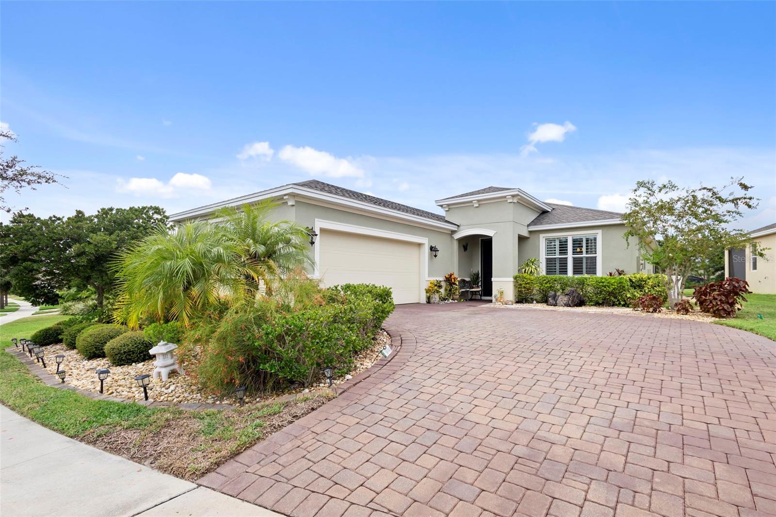 Phenomenal POOL home in the highly sought-after golf community of Victoria Hills! This beautifully maintained residence offers over 2,000 square feet of living space with 3 bedrooms, 2 bathrooms, and the HUGE benefit of fully paid-off SOLAR PANELS at closing—providing incredible energy savings and making this home even more affordable on a monthly budget. Step inside to a welcoming foyer accented with tray ceilings and wood-look tile flooring. To your right, a formal dining room connects seamlessly to the kitchen through a butler’s pantry and coffee bar walkway. The kitchen is truly a chef’s dream, featuring 42” upper cabinets, stone countertops, a natural gas range, stainless steel appliances, and an open-concept design that flows into the living room and dinette. Plantation shutters throughout the living spaces add an elevated, polished touch. The spacious living room includes an oversized sliding door leading to the screened-in pool and lanai—perfect for year-round Florida living. Just off the living room, you’ll find the private primary suite complete with a walk-in closet and spa-like ensuite bath. Toward the front of the home are bedrooms two and three, a full bathroom and the laundry room with garage access.Living in Victoria Park means access to RESORT-STYLE AMENITIES—including MULTIPLE POOLS, FITNESS CENTERS, WALKING TRAILS, VICTORIA HILLS GOLF COURSE, and convenient DINING, SHOPPING, AND MEDICAL OFFICES. HOA dues also include CABLE TV, HIGH SPEED INTERNET, AND IRRIGATION. Don’t miss your chance to tour this beautifully upgraded home—CALL TODAY TO SCHEDULE YOUR PRIVATE SHOWING.
