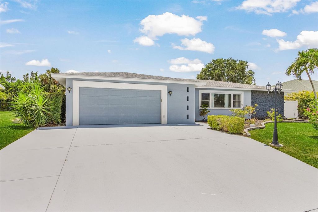 Photo of 1320 SE 26th Terrace, Cape Coral, FL 33904 (MLS # TB8510801)