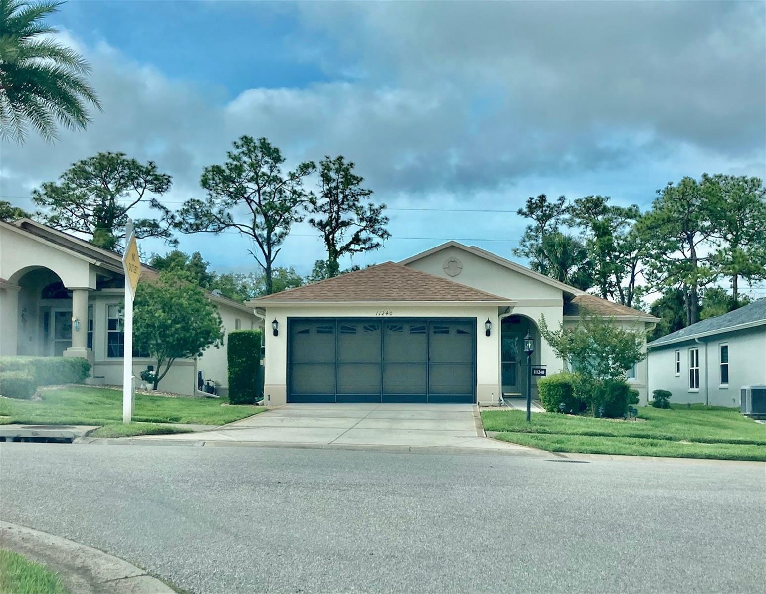 Live the Florida lifestyle in this beautifully upgraded, fully furnished 2-bedroom, 2-bath home located in a secure, guard-gated 55+ Golf/Tennis community. This meticulously maintained residence offers a spacious layout with a gorgeous kitchen featuring wood cabinetry, granite countertops, stainless steel appliances, and a cozy eating nook. The large master suite includes two walk-in closets and a luxurious walk-in shower, while the second bathroom also boasts a walk-in shower and granite finishes. A bright and versatile den/office opens to the living and dining area, perfect for both relaxing and entertaining. Included in the rent are water, sewer, trash, lawn care, and full access to the community's amenities. The property is equipped with a water softener system, and everything has been thoughtfully upgraded for comfort and convenience. Please note, tenants must set up their own Gulf membership to access golfing services. Enjoy low-maintenance, resort-style living in one of the area's most desirable active adult communities! HOA approval is required.