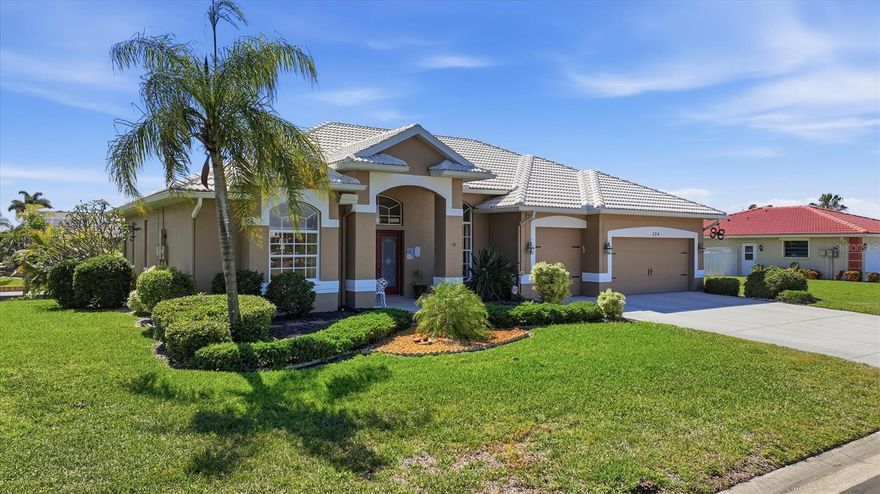 Welcome to your slice of Florida paradise in the highly desirable Englewood Isles community. This beautifully maintained Gulf-access home offers the perfect blend of coastal charm, comfort, and boating convenience, with quick access to open water. Nestled along a peaceful, street, the home features a bright and open floor plan with expansive canal views that greet you as soon as you walk in. Large sliding glass doors fill the living space with natural light and create a seamless connection to the outdoor lanai, perfect for enjoying Florida’s year-round sunshine.
The beautiful kitchen is designed for both everyday living and entertaining, complete with granite countertops, stainless steel appliances, ample cabinetry. The primary suite serves as a private retreat with tranquil water views, dual walk-in closets, and an updated ensuite bath featuring dual vanities, walk-in shower and soaking tub. Outside, you’ll find a screened lanai overlooking the wide canal, along with your own private dock and boat lift, making it easy to spend your days exploring the Gulf or enjoying sunset cruises right from your backyard.
     Additional features include a split-bedroom layout for added privacy, bathrooms w tile flooring, a three-car garage with extra storage, and mature tropical landscaping. With low annual HOA fees, this home offers privacy without sacrificing community appeal. Conveniently located just minutes from pristine Gulf beaches, local dining, golf courses, and shopping, this property is ideal as a full-time residence or seasonal escape. Experience the best of waterfront living and schedule your private showing today.