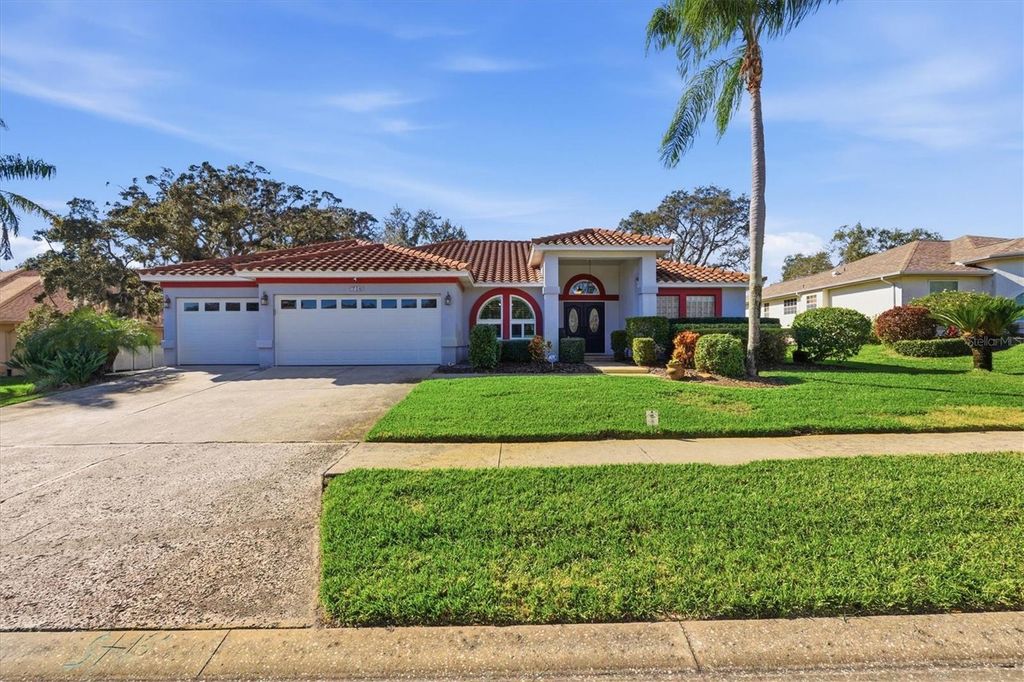 Photo of 716 Woodmont Drive, Tarpon Springs, FL 34689 (MLS # TB8467685)