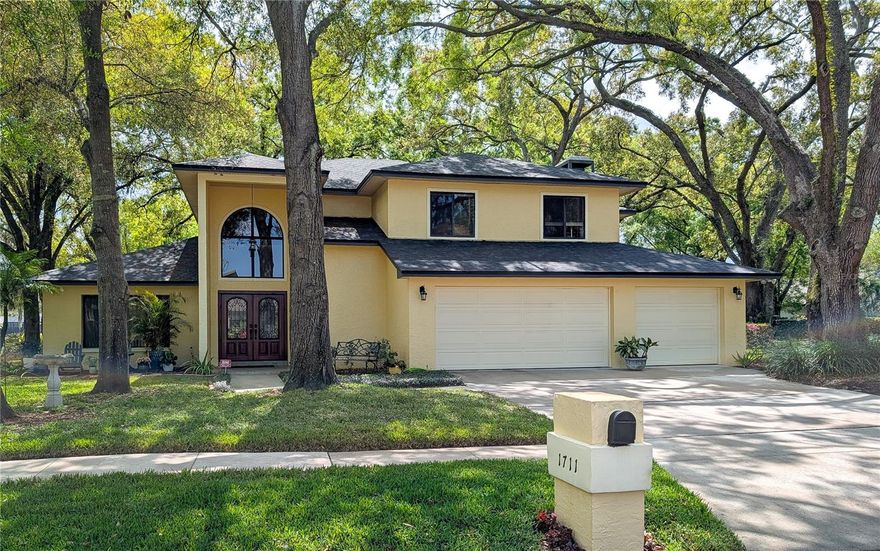 A Rare Opportunity in Coveted Lake Magdalene Manors In one of the most sought-after communities, on an oversized corner lot, this beautifully updated residence offers exceptional indoor–outdoor living with peaceful waterfront views. Lake Magdalene Manors is known for its serene tree-lined streets and community amenities, including clubhouse, tennis and pickleball courts, playground, and its unrivaled convenience to all of Tampa Bay. Expansive Living & Thoughtful Design With 3,543 square feet, 4 bedrooms, 3 full baths, and a versatile loft, this home welcomes you with a dramatic two-story foyer that sets the tone for the openness and elegance that follow. The generous primary suite provides a private retreat with a spa-inspired bath, while spacious secondary bedrooms comfortably accommodate guests. The loft offers flexibility for a home office, study area, fitness space, or creative studio. Perfect for Entertaining The heart of the home centers around an entertainment-ready kitchen and wet bar that flow seamlessly into a large family room anchored by a cozy fireplace. Serious chefs will appreciate the efficient kitchen layout, upscale stainless-steel gas range, convection oven, custom hood, and built-in refrigerator—ideal for efficient meal prep and hosting. Sliding doors open to a huge, screened lanai overlooking the updated heated pool and expansive deck—your year-round setting for casual gatherings, celebrations, game days, and relaxing weekends. The oversized yard adds abundant space for outdoor play and pets. Modern, Move-In Comforts & Recent Enhancements • Large, eat-in kitchen • Updated cabinetry and baths • Updated pool and deck • New roof and pool heater • Modern, low-maintenance flooring throughout • Updated, split air-conditioning systems • Digital cameras, thermostat, security and lighting controls • 3-car garage with workshop/storage space and easy attic access Unbeatable Tampa Bay Convenience Minutes from premier shopping and dining, top schools, major sports venues, attractions, beaches, and Tampa International Airport, this location blends quiet neighborhood living with everyday accessibility. This exceptional home—on a rare corner lot in one of Tampa’s premier communities—offers the lifestyle and space you’ve been searching for.