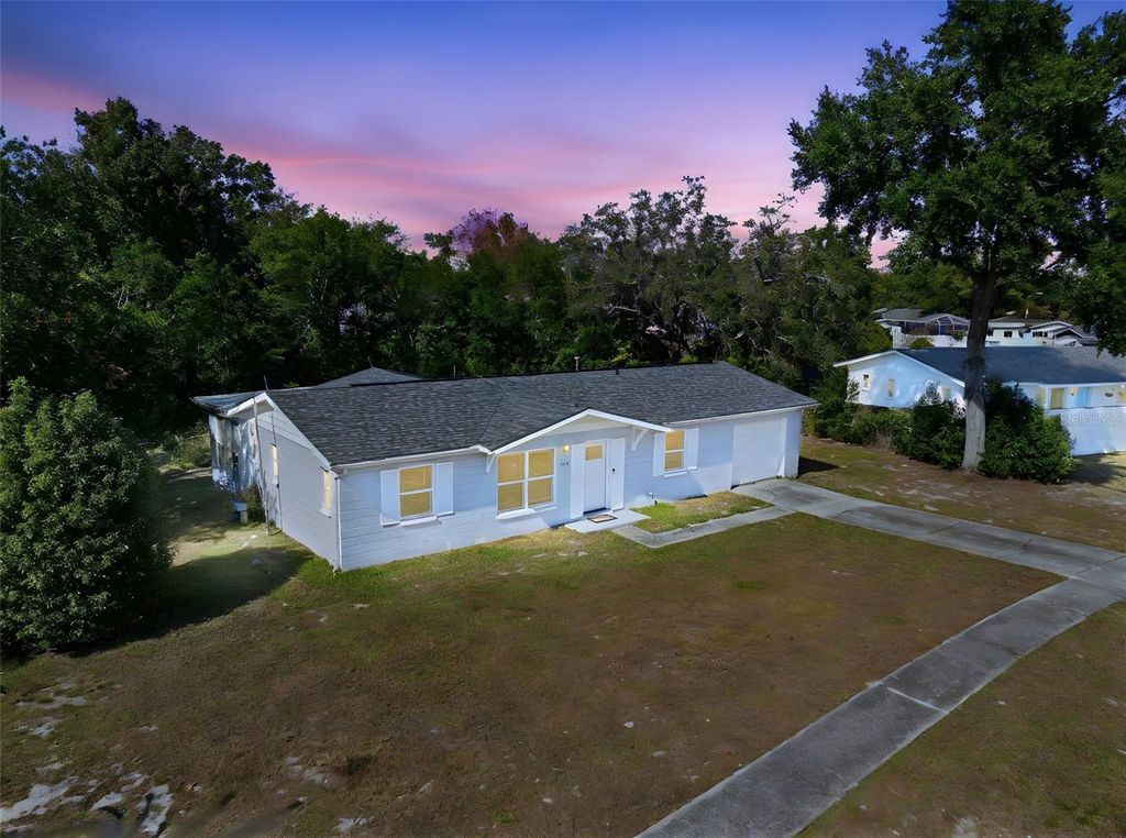 Photo of 4533 Lakeshore Avenue, Spring Hill, FL 34606 (MLS # W7880753)