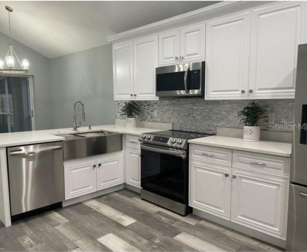 Photo of 618 Somerstone Drive, Valrico, FL 33594 (MLS # TB8454596)