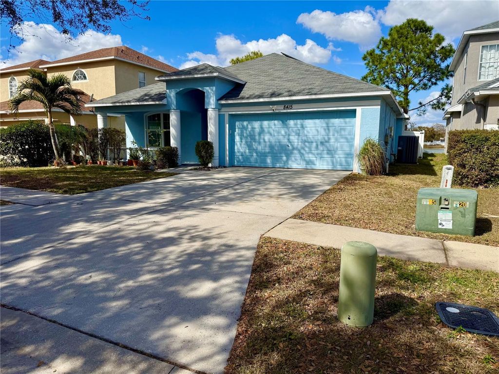 Photo of 8415 Canterbury Lake Boulevard, Tampa, FL 33619 (MLS # TB8480544)