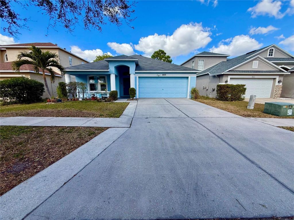 Photo of 8415 Canterbury Lake Boulevard, Tampa, FL 33619 (MLS # TB8480544)
