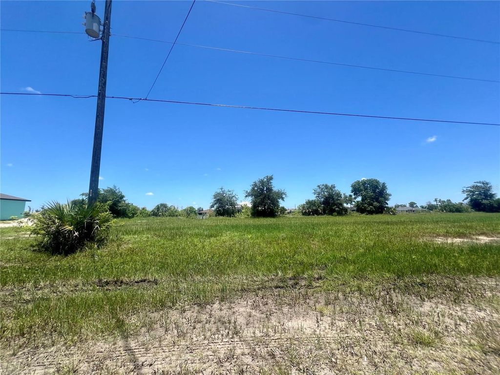 Photo of 2229 NW 9th Terrace, Cape Coral, FL 33993 (MLS # C7493953)