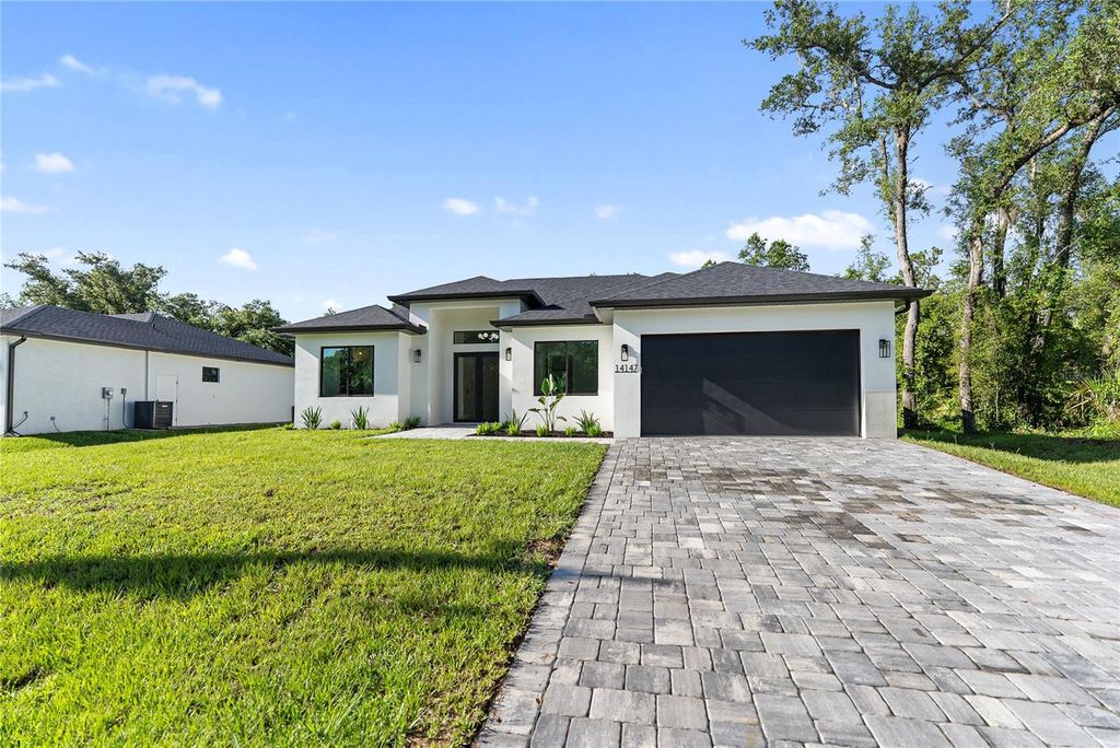 Photo of 14147 Marlin Avenue, Port Charlotte, FL 33953 (MLS # A4659269)