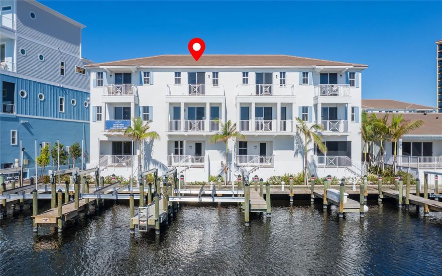 LUXURY WATERFRONT LIVING IN CAPE HARBOUR'S NEWEST GATED NEIGHBORHOOD. THE LOCK HAS BEEN REMOVED, NOW ENJOY DIRECT ACCESS JUST MINUTES TO THE GULF IN YOUR OWN BACKYARD. THIS BRAND NEW 3 STORY TOWNHOME HAS NEVER BEEN LIVED IN. SPECIAL FEATURES INCLUDE 3 BEDROOMS + DEN, 4 BATHROOMS, IN-UNIT LAUNDRY, PRIVATE ELEVATOR, 2 CAR GARAGE, PRIVATE BOAT SLIP + NEWER (2024) 16,000 LIFT, WELL IS 35 X 16. THERE ARE 2 LARGE BALCONIES WITH SOUTHERN EXPOSURES, OVER LOOKING SANIBEL AND AMAZING SUNSETS. GOURMET KITCHEN AND LVT THROUGHOUT. GATED COMMUNITY WITH RESORT STYLE AMENITIES: MARINA, DINING, LIVE ENTERTAINMENT, POOL, TENNIS, SHOPPING AND MORE. LIVE THE BOATING LIFESTYLE IN SOUTHWEST FLORIDA'S PREMIER COSTAL NEIGHBORHOOD. PETS ARE WELCOME, INVESTORS CAN RENT THIS UNIT WEEKLY - 52 TIMES A YEAR. SELLER FINANCING AVAILABLE. MONTHLY HOA'S INCLUDE EXTERIOR HAZARD & FLOOD INSURANCE. PLEASE CLICK THE LINK TO WATCH THE VIRTUAL TOUR.