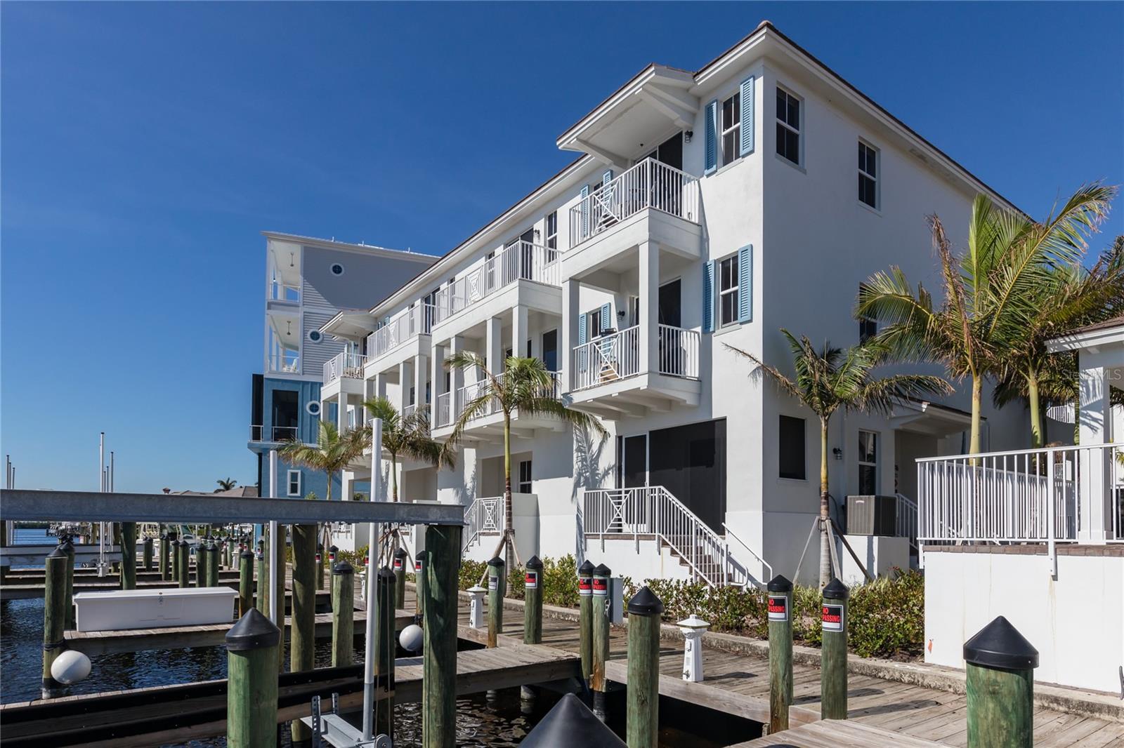 LUXURY WATERFRONT LIVING IN CAPE HARBOUR'S NEWEST GATED NEIGHBORHOOD. THE LOCK HAS BEEN REMOVED, NOW ENJOY DIRECT ACCESS JUST MINUTES TO THE GULF IN YOUR OWN BACKYARD. THIS BRAND NEW 3 STORY TOWNHOME HAS NEVER BEEN LIVED IN. SPECIAL FEATURES INCLUDE 3 BEDROOMS + DEN, 4 BATHROOMS, IN-UNIT LAUNDRY, PRIVATE ELEVATOR, 2 CAR GARAGE, PRIVATE BOAT SLIP + NEWER (2024) 16,000 LIFT, WELL IS 35 X 16. THERE ARE 2 LARGE BALCONIES WITH SOUTHERN EXPOSURES, OVER LOOKING SANIBEL AND AMAZING SUNSETS. GOURMET KITCHEN AND LVT THROUGHOUT. GATED COMMUNITY WITH RESORT STYLE AMENITIES: MARINA, DINING, LIVE ENTERTAINMENT, POOL, TENNIS, SHOPPING AND MORE. LIVE THE BOATING LIFESTYLE IN SOUTHWEST FLORIDA'S PREMIER COSTAL NEIGHBORHOOD. PETS ARE WELCOME, INVESTORS CAN RENT THIS UNIT WEEKLY - 52 TIMES A YEAR. SELLER FINANCING AVAILABLE. PLEASE CLICK THE LINK TO WATCH THE VIRTUAL TOUR.
